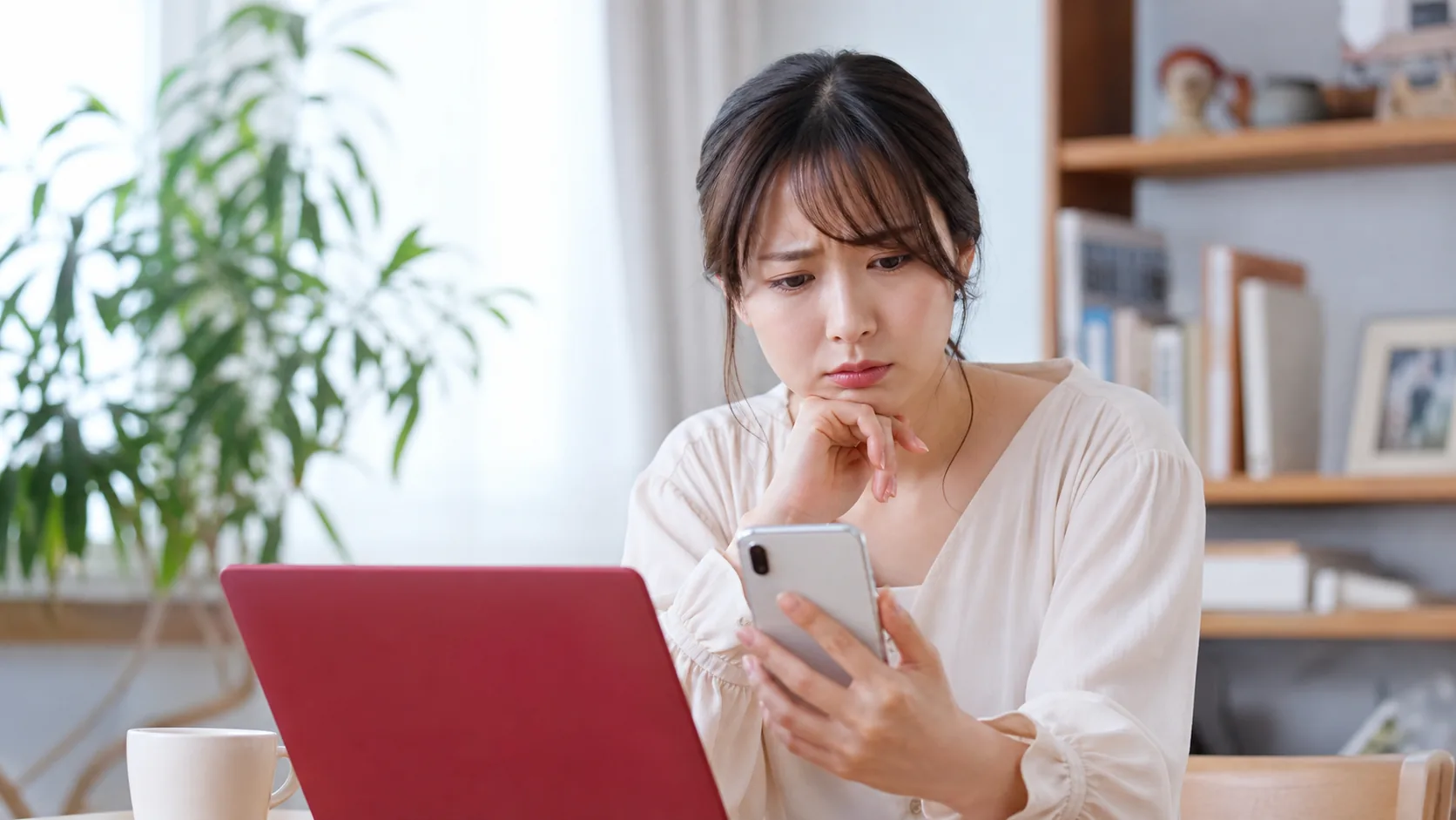 登録済み電話番号が使えず困る女性